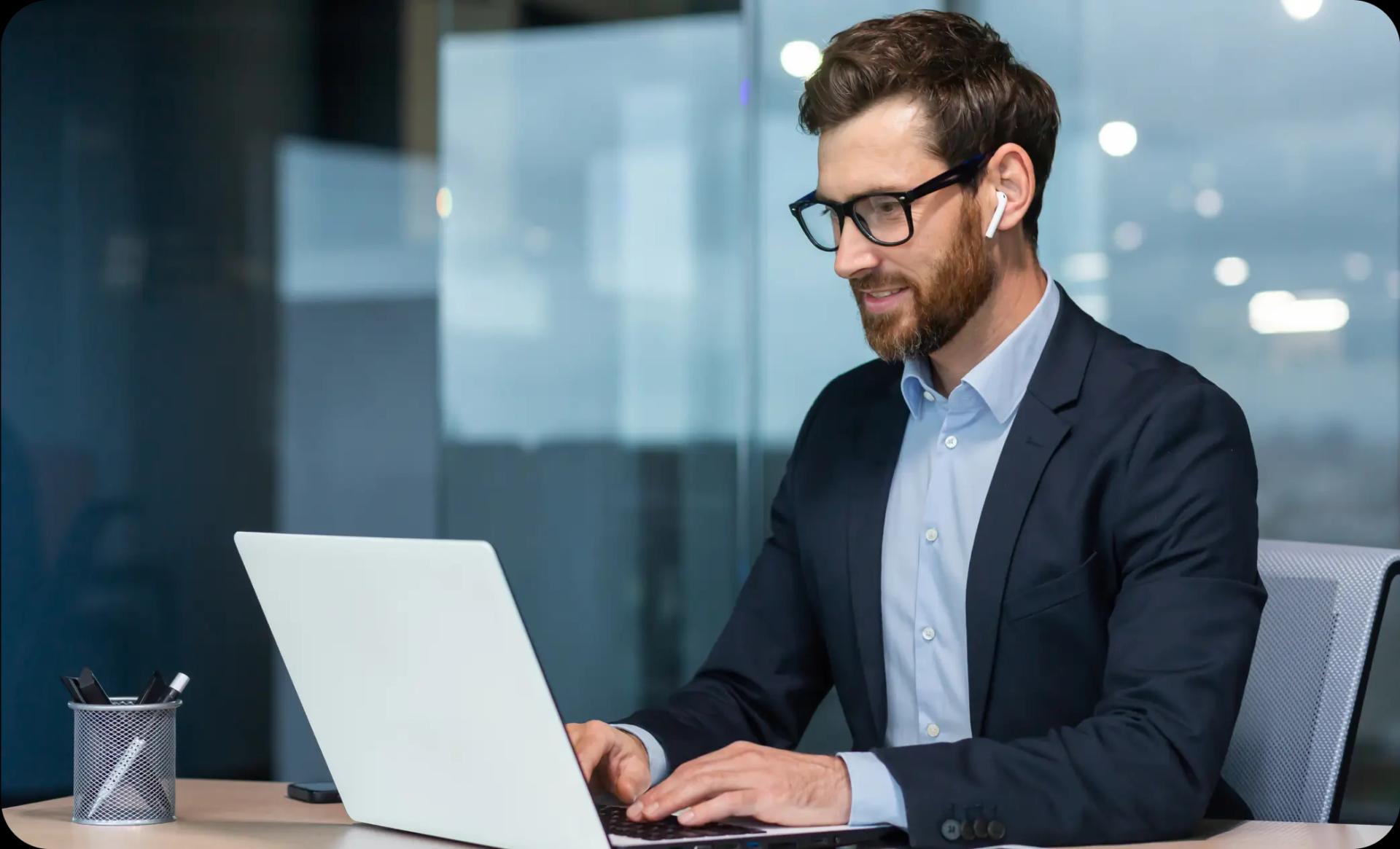 man looking at laptop